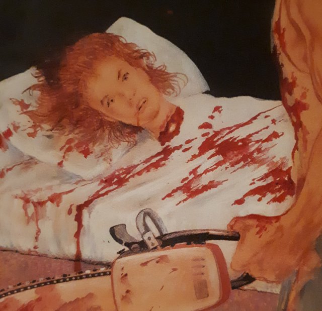 severed head decapitated by chainsaw